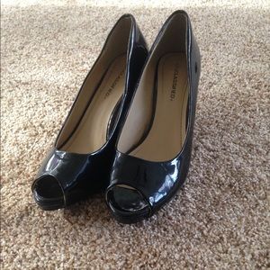 Black peep toe pumps ( city classified)